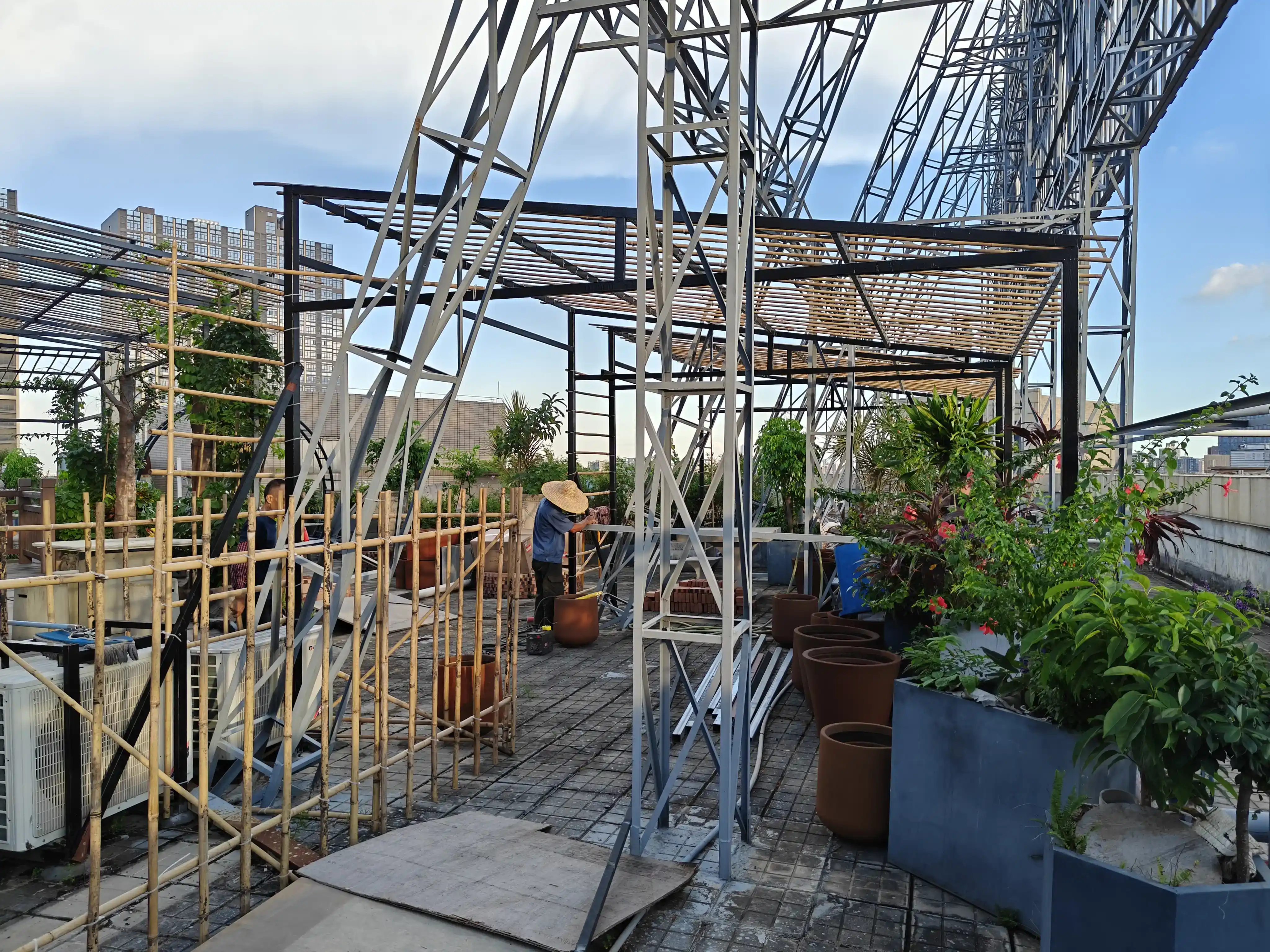 Rooftop framework and planting areas taking shape during the early Vinca Garden build